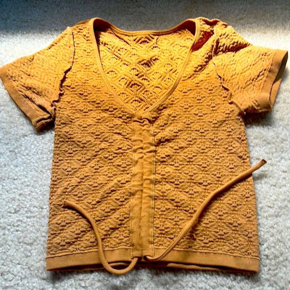 Adjustable center, rust colored, v neck top